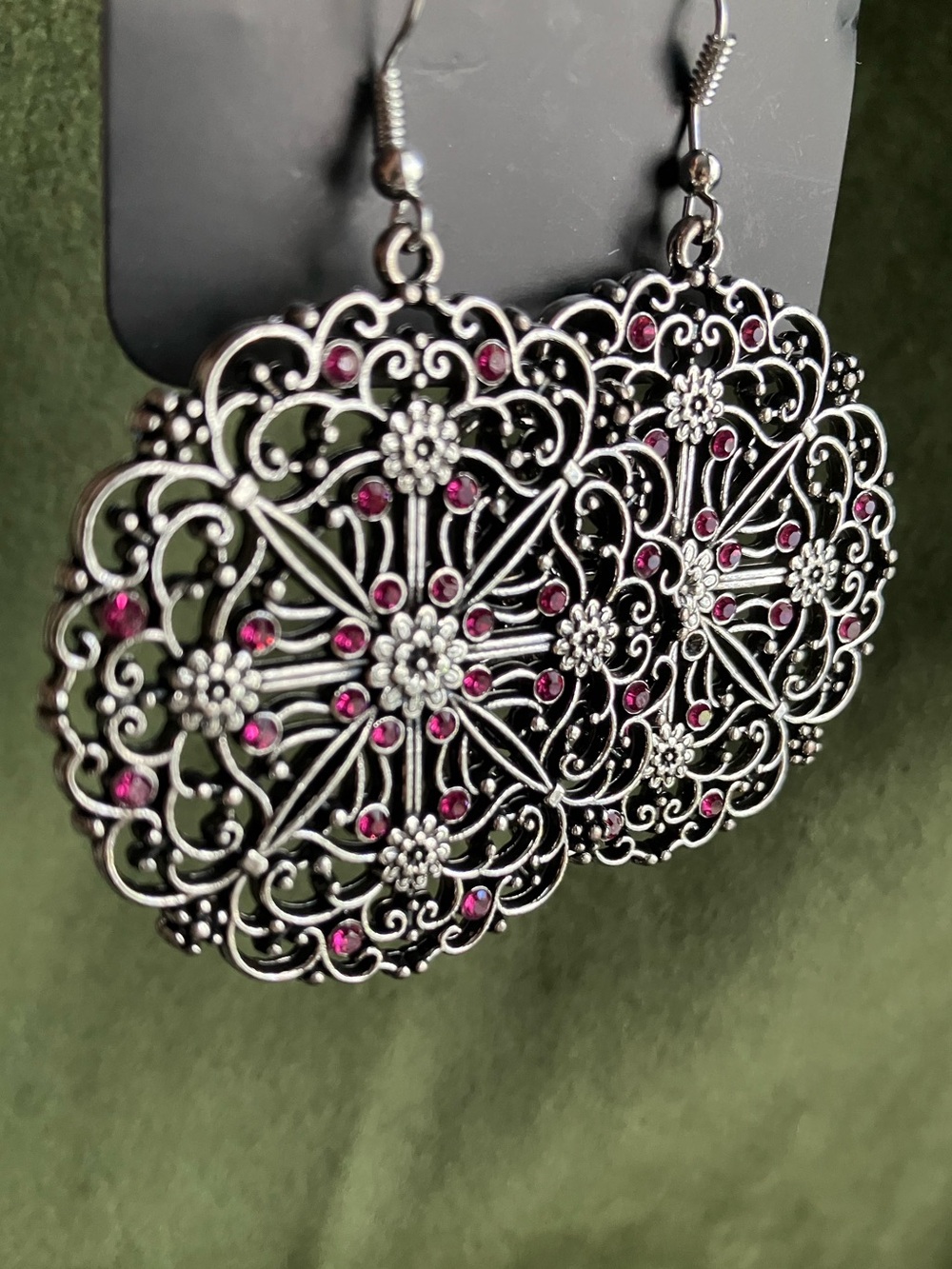 Round silver and pink rhinestone earrings